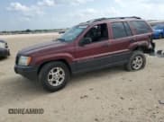 ✅ 1999 Jeep Grand Cherokee Laredo • VIN: 1J4G258S0XC563922 • Лот: 55491645. Опубликован ранее на Copart с пробегом Не указан. Бесплатный доступ к архиву аукционных продаж из США и подробный отчёт об истории автомобиля на DreamBid. Изображение 1.