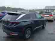 2023 Hyundai Tucson Blue z VIN KM8JBCA10PU092863, wystawiony jako IAAI lot #43233471 z przebiegiem 53 213 mil mil oraz . Historia ofert i sprzedaży dostępna na DreamBid. Obrazek 4.