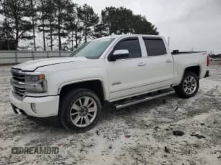 2016 Chevrolet Silverado 1500 High Country с VIN 3GCUKTEJXGG166563, выставлен на аукционе Copart как лот 45870055 с пробегом 162 970 миль миль и Списание • Salvage title. История ставок и продаж доступна на DreamBid. Изображение 1.