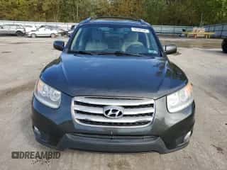 2012 Hyundai Santa Fe Limited с VIN 5XYZKDAG3CG151479, выставлен на аукционе Copart как лот 74742144 с пробегом 156 598 миль миль и Списание • Salvage title. История ставок и продаж доступна на DreamBid. Изображение 5.