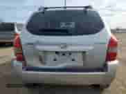 2009 Hyundai Tucson GLS with VIN KM8JM12B79U012399, listed as a Copart auction lot 77663414 with 164,615 mi miles and Salvage title. Bid and sale history available at DreamBid. Image 6.