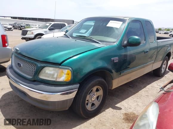 ✅ 1999 Ford F-150 XL • VIN: 1FTRX17L5XKA29212 • Lot: 42359916. Listed on IAAI with 131,137 mi. Free auction sales archive from the USA and detailed vehicle history report at DreamBid. Image 2.