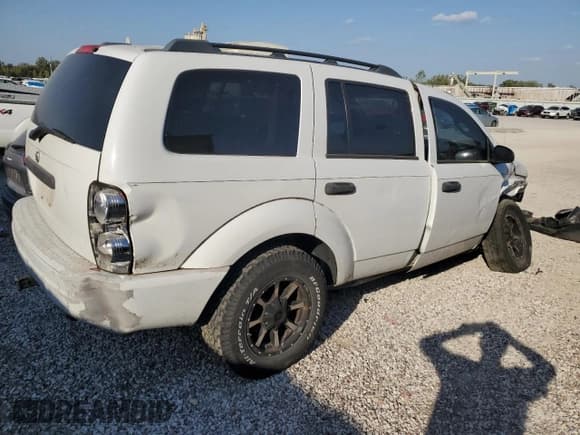 ✅ 2005 Dodge Durango SXT • VIN: 1D4HD38N25F545441 • Лот: 82235575. Опубликован ранее на Copart с пробегом 245 131 миль. Бесплатный доступ к архиву аукционных продаж из США и подробный отчёт об истории автомобиля на DreamBid. Изображение 3.