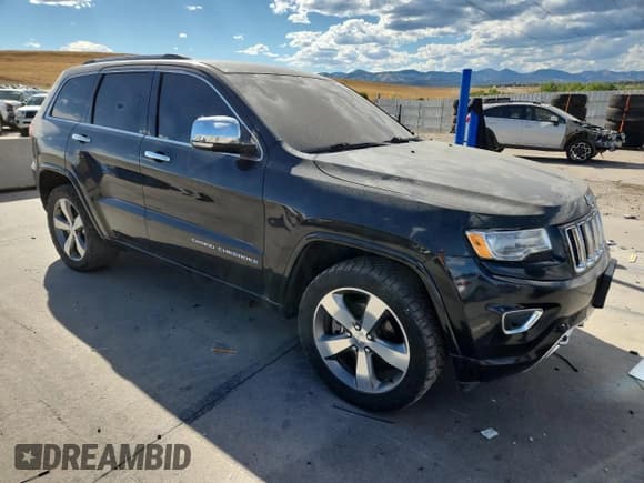 ✅ 2015 Jeep Grand Cherokee Overland • VIN: 1C4RJFCM9FC762451 • Lot: 80275465. Listed on Copart with 138,061 mi. Free auction sales archive from the USA and detailed vehicle history report at DreamBid. Image 4.