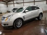 ✅ 2014 Cadillac SRX Performance Collection • VIN: 3GYFNFE37ES559315 • Lot: 89825135. Listed on Copart with 185,563 mi. Free auction sales archive from the USA and detailed vehicle history report at DreamBid. Image 1.