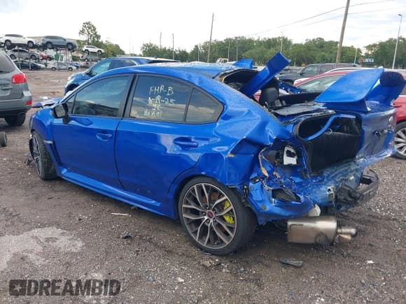 ✅ 2020 Subaru WRX STI • VIN: JF1VA2E67L9831559 • Lot: 42574564. Listed on IAAI with 67,333 mi. Free auction sales archive from the USA and detailed vehicle history report at DreamBid. Image 3.
