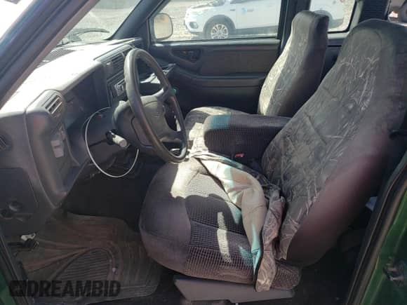 1997 Chevrolet S-10 LS with VIN 1GCDT19X5V8103938, listed as a Copart auction lot 52643405 with 204,691 mi miles and Salvage title. Bid and sale history available at DreamBid. Image 7.