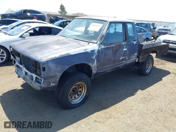 ✅ 1984 Datsun 720 • VIN: JN6ND06Y1EW020315 • Лот: 42083962. Опубликован ранее на IAAI с пробегом 187 143 миль. Бесплатный доступ к архиву аукционных продаж из США и подробный отчёт об истории автомобиля на DreamBid. Изображение 2.