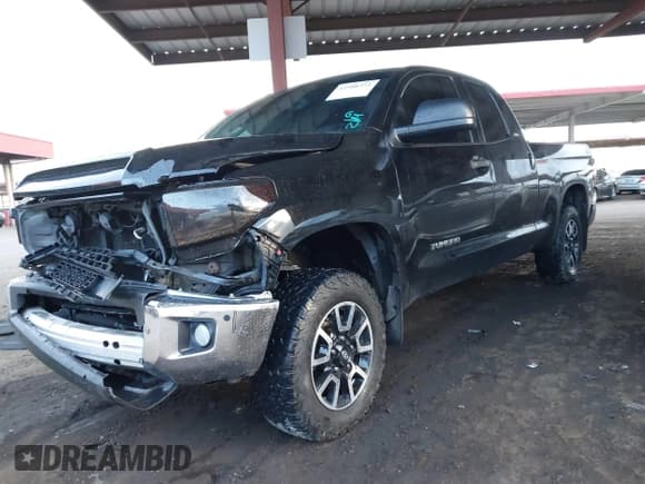 ✅ 2016 Toyota Tundra SR • VIN: 5TFUY5F18GX558509 • Lot: 41588352. Listed on IAAI with 108,960 mi. Free auction sales archive from the USA and detailed vehicle history report at DreamBid. Image 2.