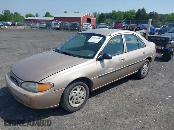 ✅ 1999 Ford Escort LX • VIN: 1FAFP10P7XW198467 • Lot: 42278961. Listed on IAAI with 293,835 mi. Free auction sales archive from the USA and detailed vehicle history report at DreamBid. Image 2.