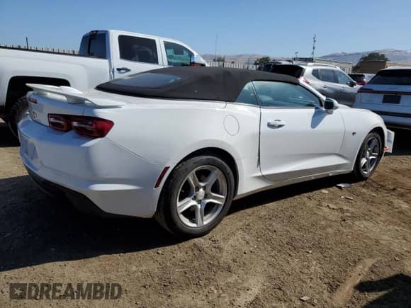 2019 Chevrolet Camaro 1LT с VIN 1G1FB3DX1K0139885, выставлен на аукционе Copart как лот 62923675 с пробегом 94 417 миль миль и Списание • Salvage title. История ставок и продаж доступна на DreamBid. Изображение 3.