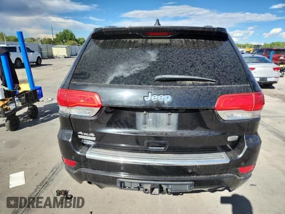 ✅ 2015 Jeep Grand Cherokee Overland • VIN: 1C4RJFCM9FC762451 • Lot: 80275465. Listed on Copart with 138,061 mi. Free auction sales archive from the USA and detailed vehicle history report at DreamBid. Image 6.