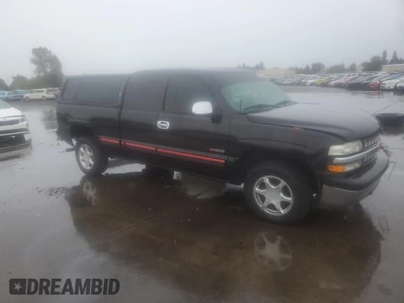 ✅ 2001 Chevrolet Silverado 1500 LS • VIN: 2GCEK19TX11185053 • Lot: 81814025. Listed on Copart with 133,725 mi. Free auction sales archive from the USA and detailed vehicle history report at DreamBid. Image 4.