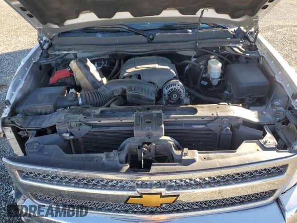 2013 Chevrolet Silverado 1500 LT with VIN 3GCPKSE71DG370823, listed as a Copart auction lot 90091465 with 128,265 mi miles and Salvage title. Bid and sale history available at DreamBid. Image 11.