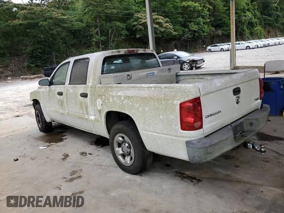 2005 Dodge Dakota ST with VIN 1D7HE28K75S151411, listed as a Copart auction lot 58223775 with 218,017 mi miles and Clean title. Bid and sale history available at DreamBid. Image 2.