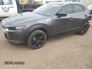 ✅ 2023 Mazda CX-30 Premium • VIN: 3MVDMBDY4PM521889 • Lot: 82426245. Listed on Copart with 36,246 mi. Free auction sales archive from the USA and detailed vehicle history report at DreamBid. Image 1.