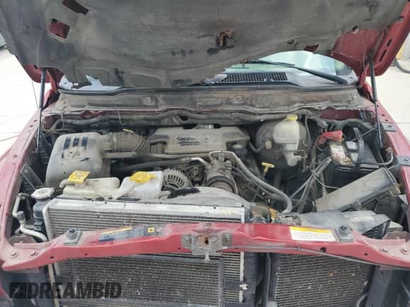 2006 Dodge 1500 Laramie z VIN 1D7HU18216S573270, wystawiony jako Copart lot #62885405 z przebiegiem 199 766 mil mil oraz Szkoda całkowita • Salvage title. Historia ofert i sprzedaży dostępna na DreamBid. Obrazek 11.