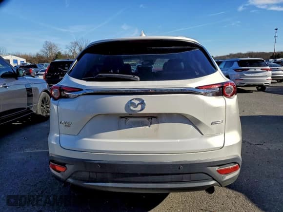 ✅ 2018 Mazda CX-9 Touring • VIN: JM3TCBCY2J0207175 • Лот: 93869375. Опубликован ранее на Copart с пробегом 127 996 миль. Бесплатный доступ к архиву аукционных продаж из США и подробный отчёт об истории автомобиля на DreamBid. Изображение 6.