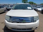 ✅ 2009 Ford Taurus X Limited • VIN: 1FMDK03W99GA03698 • Lot: 42243428. Listed on IAAI with 158,551 mi. Free auction sales archive from the USA and detailed vehicle history report at DreamBid. Image 12.