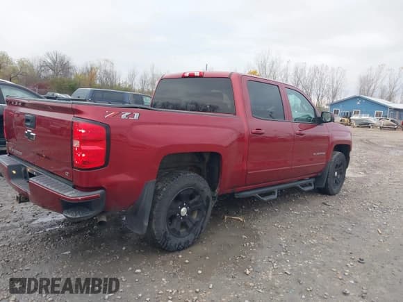 ✅ 2018 Chevrolet Silverado 1500 LT • VIN: 3GCUKREC6JG585828 • Lot: 43659037. Listed on IAAI with 130,703 mi. Free auction sales archive from the USA and detailed vehicle history report at DreamBid. Image 4.