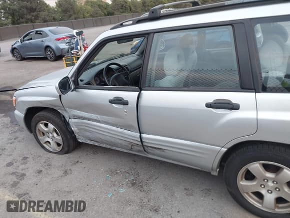 ✅ 2002 Subaru Forester S • VIN: JF1SF65642H740331 • Lot: 43326262. Listed on IAAI with 107,160 mi. Free auction sales archive from the USA and detailed vehicle history report at DreamBid. Image 6.