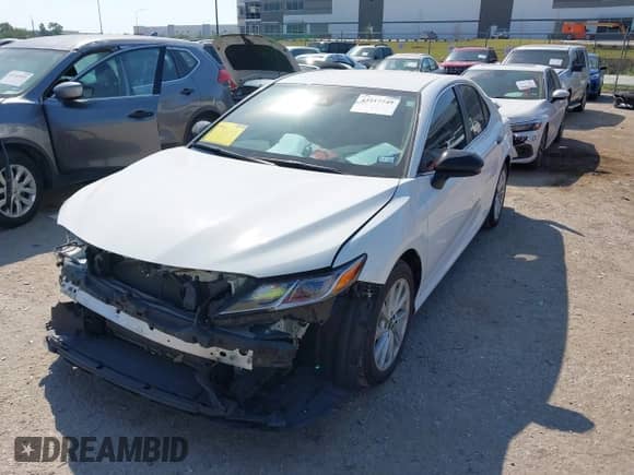 2022 Toyota Camry LE с VIN 4T1C11AK5NU680666, выставлен на аукционе IAAI как лот 43217749 с пробегом 59 913 миль миль и . История ставок и продаж доступна на DreamBid. Изображение 2.