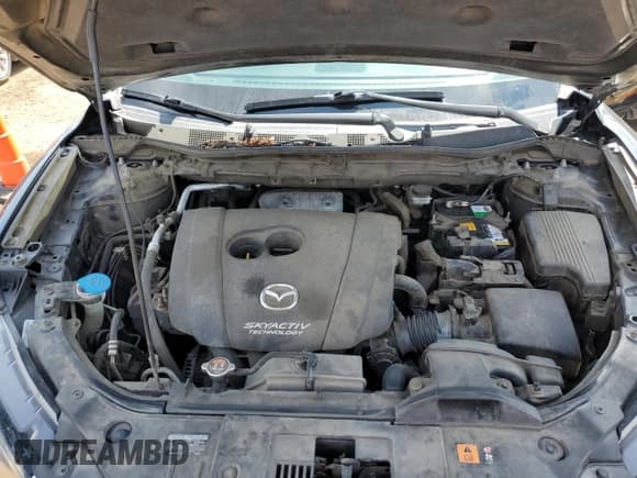 ✅ 2014 Mazda CX-5 Sport • VIN: JM3KE2BE0E0335126 • Lot: 56555315. Listed on Copart with 116,718 mi. Free auction sales archive from the USA and detailed vehicle history report at DreamBid. Image 12.