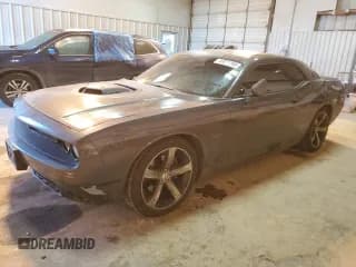 ✅ 2016 Dodge Challenger R/T • VIN: 2C3CDZBT1GH157737 • Lot: 40671184. Wystawiony na Copart z przebiegiem 133 872 mil. Bezpłatny archiwum sprzedaży aukcyjnych z USA i szczegółowy raport historii pojazdu na DreamBid. Zdjęcie 1.