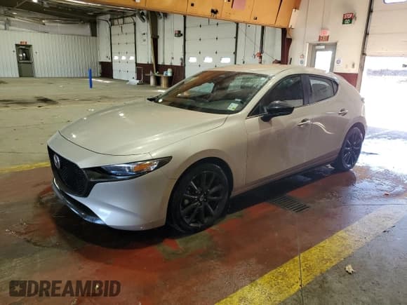 ✅ 2025 Mazda 3 S Select Sport • VIN: JM1BPAKM5S1752560 • Lot: 86105245. Listed on Copart with 30,669 mi. Free auction sales archive from the USA and detailed vehicle history report at DreamBid. Image 1.