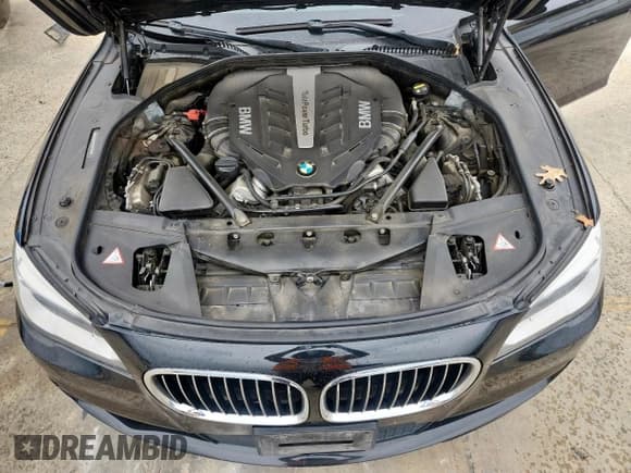 ✅ 2015 BMW 7 Series 750i • VIN: WBAYA8C54FG197788 • Lot: 63431285. Listed on Copart with 114,581 mi. Free auction sales archive from the USA and detailed vehicle history report at DreamBid. Image 11.