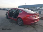 ✅ 2017 Ford Fusion Hybrid Titanium • VIN: 3FA6P0RU8HR277590 • Lot: 43668115. Listed on IAAI with Not provided. Free auction sales archive from the USA and detailed vehicle history report at DreamBid. Image 3.