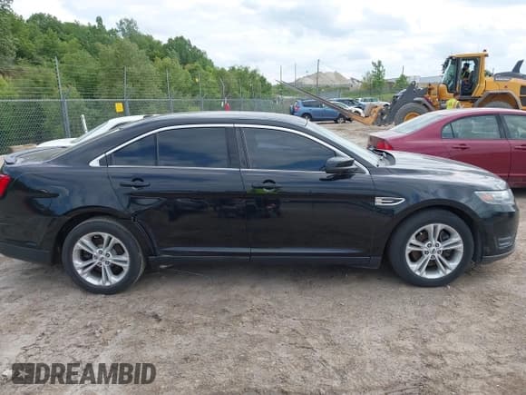 ✅ 2016 Ford Taurus SEL • VIN: 1FAHP2E82GG156346 • Lot: 42468616. Listed on IAAI with 159,425 mi. Free auction sales archive from the USA and detailed vehicle history report at DreamBid. Image 13.