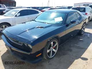 2013 Dodge Challenger SRT-8 z VIN 2C3CDYCJ3DH587739, wystawiony jako IAAI lot #43148385 z przebiegiem 60 177 mil mil oraz . Historia ofert i sprzedaży dostępna na DreamBid. Obrazek 2.