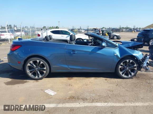 ✅ 2016 Buick Cascada Premium • VIN: W04WT3N52GG037019 • Lot: 42181815. Listed on IAAI with 62,258 mi. Free auction sales archive from the USA and detailed vehicle history report at DreamBid. Image 14.