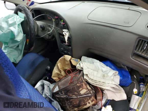 2004 Hyundai Elantra GLS z VIN KMHDN46D24U917410, wystawiony jako Copart lot #76782274 z przebiegiem 251 791 mil mil oraz Szkoda całkowita • Salvage title. Historia ofert i sprzedaży dostępna na DreamBid. Obrazek 8.