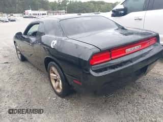 2014 Dodge Challenger SXT z VIN 2C3CDYAG0EH285933, wystawiony jako IAAI lot #43391041 z przebiegiem Nie podano mil oraz . Historia ofert i sprzedaży dostępna na DreamBid. Obrazek 3.