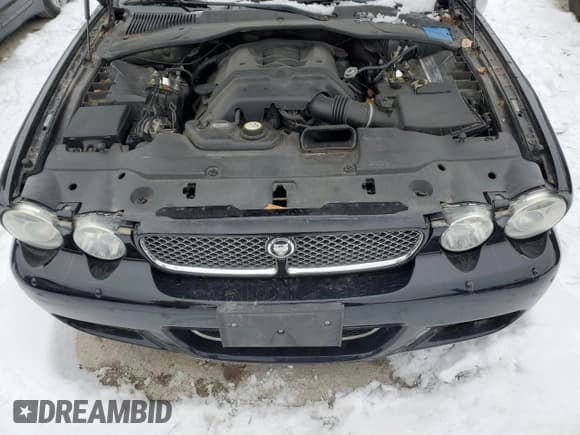 ✅ 2008 Jaguar XJ 8 LWB • VIN: SAJWA79B78SH22784 • Лот: 79058704. Опубликован ранее на Copart с пробегом Не указан. Бесплатный доступ к архиву аукционных продаж из США и подробный отчёт об истории автомобиля на DreamBid. Изображение 11.