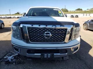 ✅ 2016 Nissan Titan Platinum Reserve • VIN: 1N6BA1F29GN516548 • Lot: 84054855. Wystawiony na Copart z przebiegiem 194 897 mil. Bezpłatny archiwum sprzedaży aukcyjnych z USA i szczegółowy raport historii pojazdu na DreamBid. Zdjęcie 5.