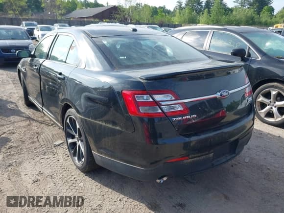 ✅ 2014 Ford Taurus SHO • VIN: 1FAHP2KT5EG136579 • Lot: 42384706. Listed on IAAI with 82,514 mi. Free auction sales archive from the USA and detailed vehicle history report at DreamBid. Image 3.