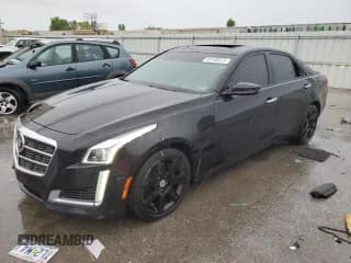 ✅ 2014 Cadillac CTS Premium AWD • VIN: 1G6AZ5S37E0131094 • Lot: 59180975. Listed on Copart with 119,592 mi. Free auction sales archive from the USA and detailed vehicle history report at DreamBid. Image 1.