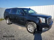 ✅ 2018 GMC Yukon XL SLT • VIN: 1GKS1GKC0JR332799 • Lot: 68890115. Listed on Copart with 147,905 mi. Free auction sales archive from the USA and detailed vehicle history report at DreamBid. Image 4.