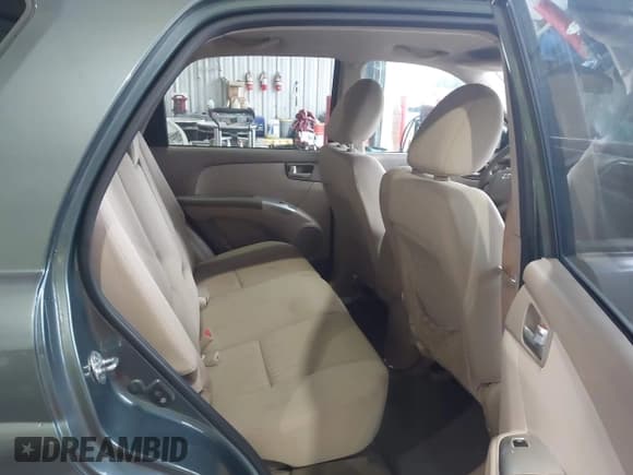 ✅ 2009 Kia Sportage EX • VIN: KNDJF723397563597 • Лот: 43800554. Опубликован ранее на IAAI с пробегом 196 423 миль. Бесплатный доступ к архиву аукционных продаж из США и подробный отчёт об истории автомобиля на DreamBid. Изображение 8.