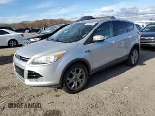 ✅ 2013 Ford Escape SEL • VIN: 1FMCU9HXXDUC40447 • Lot: 93390555. Listed on Copart with 120,437 mi. Free auction sales archive from the USA and detailed vehicle history report at DreamBid. Image 1.