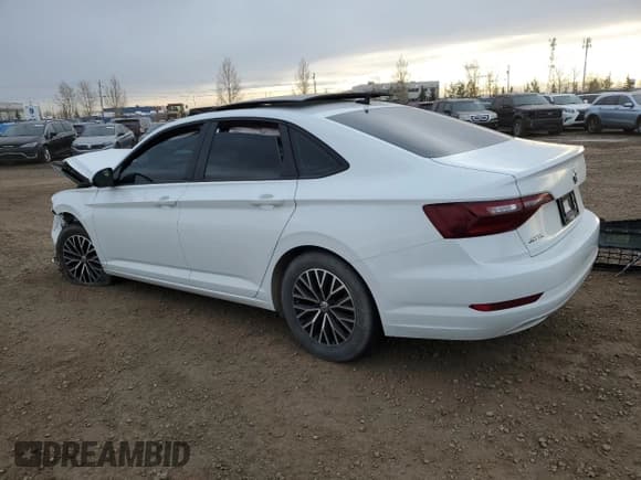 ✅ 2021 Volkswagen Jetta SEL • VIN: 3VWE57BU0MM061395 • Лот: 80946824. Опубликован ранее на Copart с пробегом 100 604 миль. Бесплатный доступ к архиву аукционных продаж из США и подробный отчёт об истории автомобиля на DreamBid. Изображение 2.