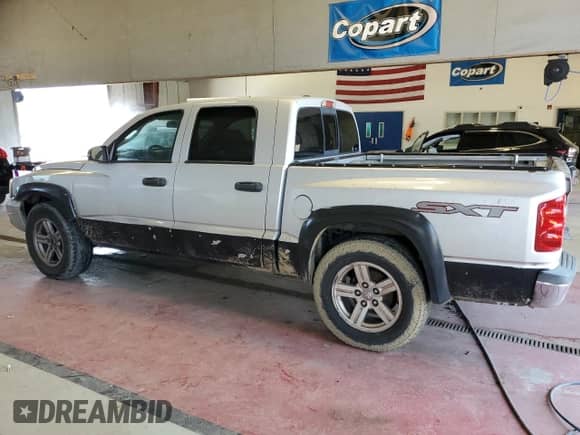 2007 Dodge Dakota ST с VIN 1D7HW28K57S267433, выставлен на аукционе Copart как лот 55449574 с пробегом 196 488 миль миль и Списание • Salvage title. История ставок и продаж доступна на DreamBid. Изображение 2.