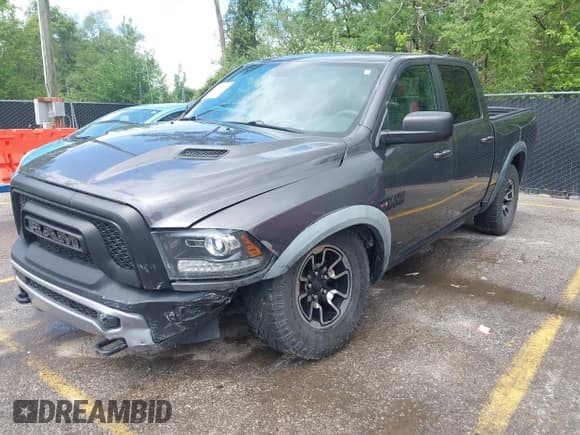✅ 2015 Ram 1500 Rebel • VIN: 1C6RR7YTXFS785507 • Lot: 42172925. Listed on IAAI with 100,201 mi. Free auction sales archive from the USA and detailed vehicle history report at DreamBid. Image 19.