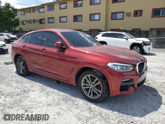✅ 2020 BMW X4 xDrive30i • VIN: 5UX2V1C03L9D42099 • Лот: 63714835. Опубликован ранее на Copart с пробегом 70 743 миль. Бесплатный доступ к архиву аукционных продаж из США и подробный отчёт об истории автомобиля на DreamBid. Изображение 4.