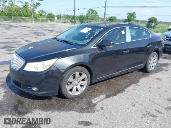✅ 2012 Buick LaCrosse Premium 3 • VIN: 1G4GH5E35CF340524 • Lot: 42434141. Listed on IAAI with 174,600 mi. Free auction sales archive from the USA and detailed vehicle history report at DreamBid. Image 2.
