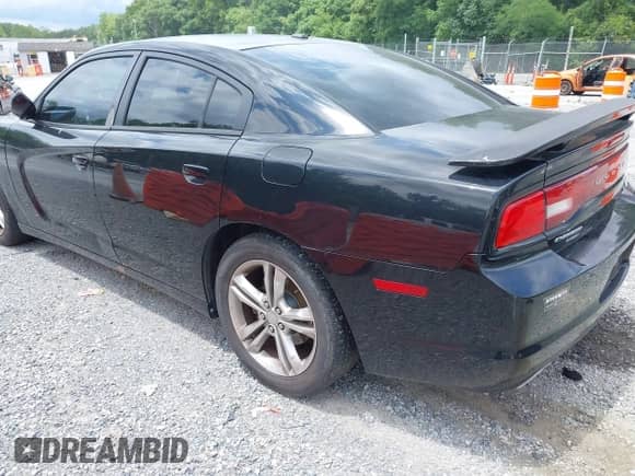 2012 Dodge Charger SXT Plus z VIN 2C3CDXJG3CH183873, wystawiony jako IAAI lot #42768967 z przebiegiem 257 873 mil mil oraz . Historia ofert i sprzedaży dostępna na DreamBid. Obrazek 3.