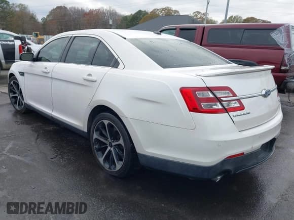 ✅ 2015 Ford Taurus SHO • VIN: 1FAHP2KTXFG158854 • Lot: 43689890. Listed on IAAI with 106,819 mi. Free auction sales archive from the USA and detailed vehicle history report at DreamBid. Image 3.